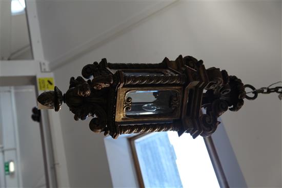 A large 19th century carved giltwood hanging lantern, 43in.